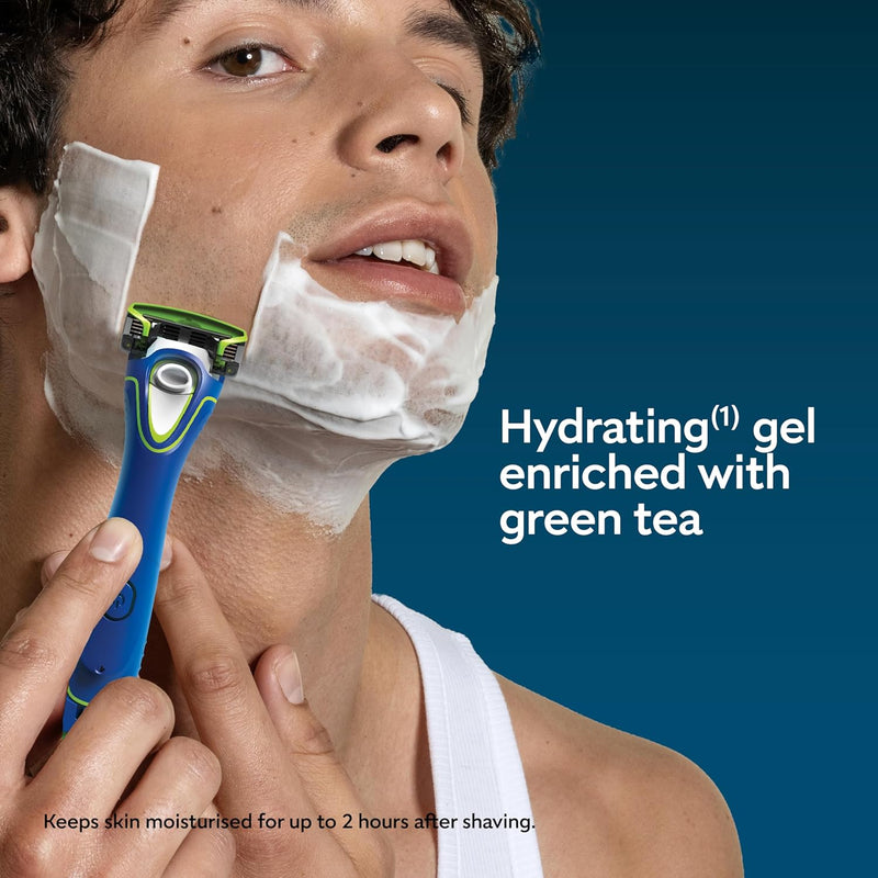 Man shaving with the Wilkinson Sword Face Groomer, hydrating gel enriched with green tea