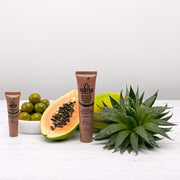 Dr PAWPAW Rich Mocha Balm tubes beside papaya, olives and aloe vera