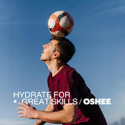 Footballer heading a ball, Oshee hydrate for great skills